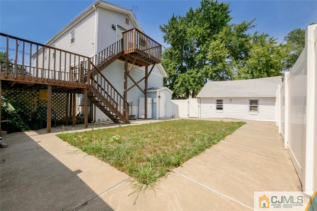 65 Meadow Road Edison, NJ 08817 - Photo 3 of 24 a view of a house with a patio