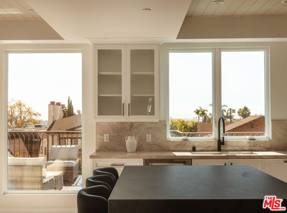 10725 Ashton Avenue, Unit 101 Los Angeles, CA 90024 - Photo 16 of 40 a view of a living room and a window