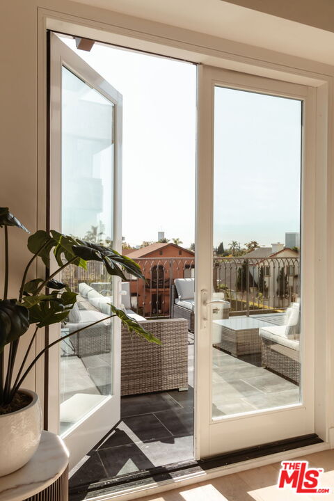 10725 Ashton Avenue, Unit 101 Los Angeles, CA 90024 - Photo 18 of 40 a view of a balcony door