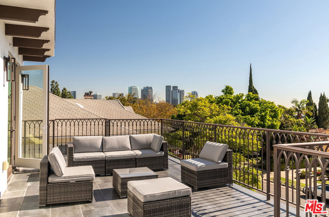 10725 Ashton Avenue, Unit 101 Los Angeles, CA 90024 - Photo 19 of 40 a view of a roof deck with couches