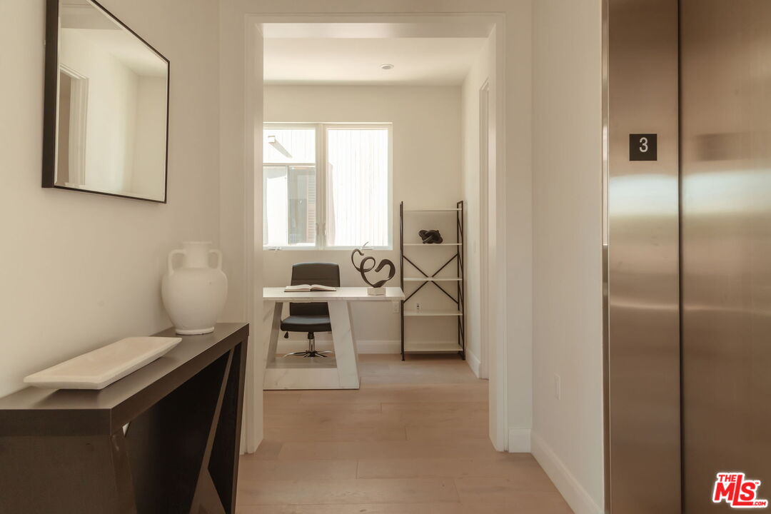 10725 Ashton Avenue, Unit 101 Los Angeles, CA 90024 - Photo 3 of 40 a living room with furniture