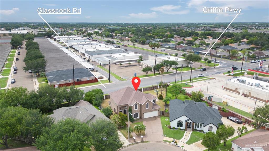 2001 Quail Lane Mission, TX 78572 - Photo 27 of 28 Two-story residence featuring a brick facade, attached garage, and a gabled roof