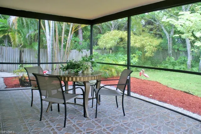a view of a outdoor seating area with furniture and garden