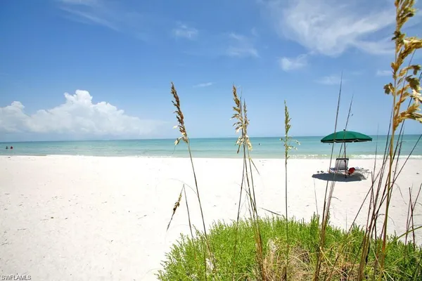 a view of an ocean from a ceiling fan