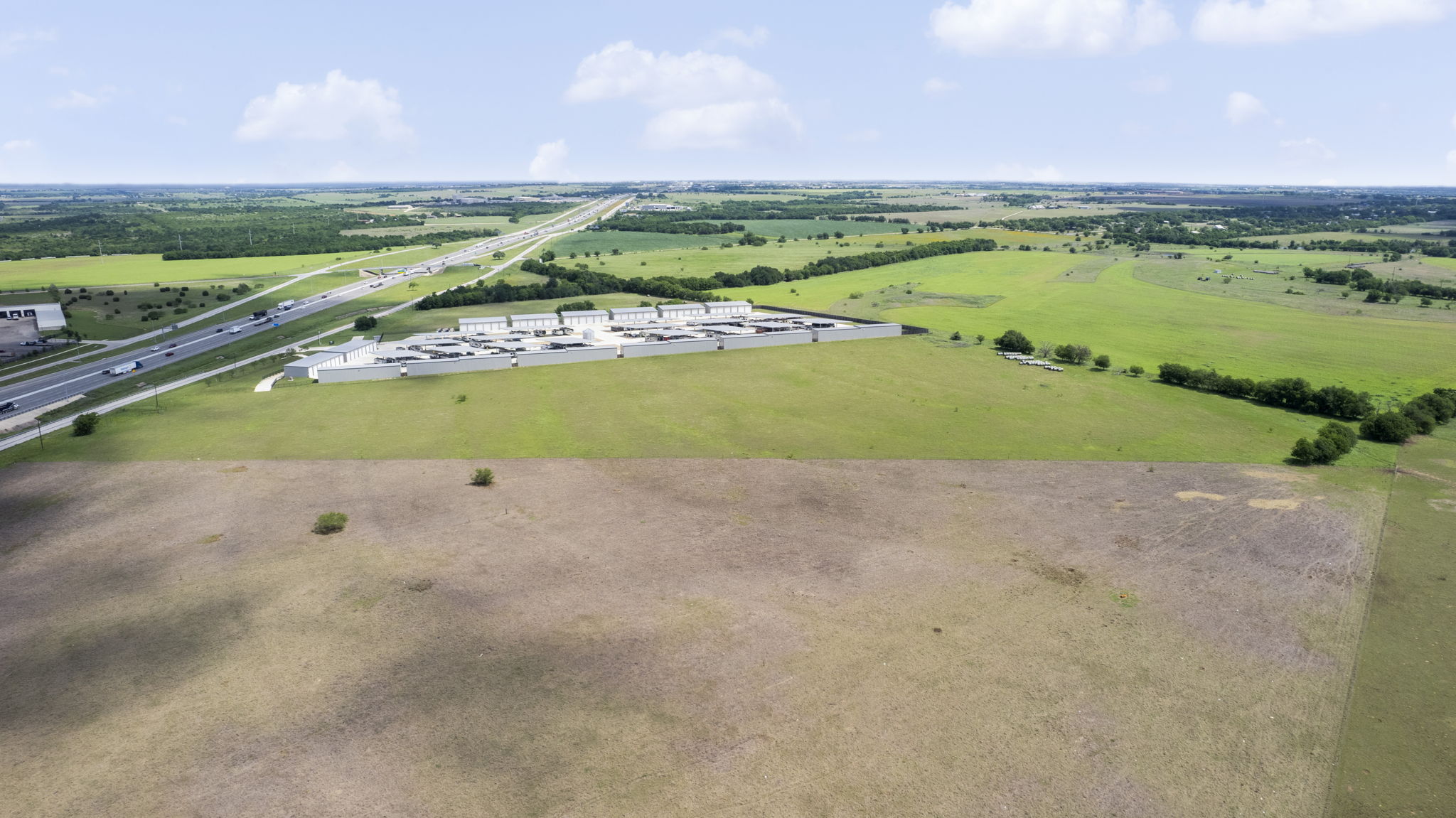 6100 Interstate 35 Georgetown, TX 78626 - Photo 4 of 11 Expansive land parcel featuring direct highway frontage and proximity to existing commercial structures