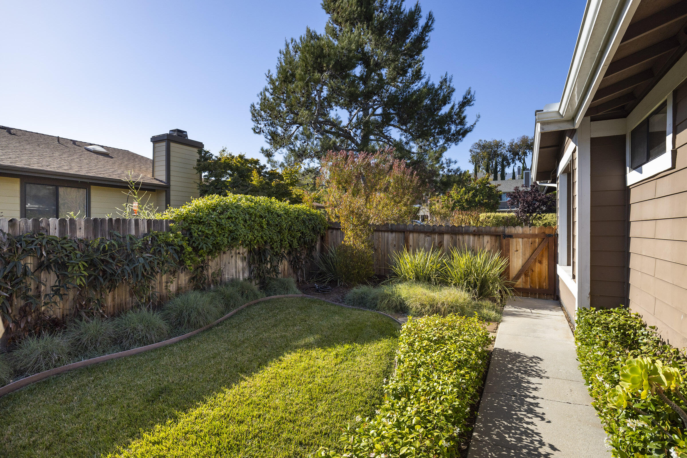 4017 Primavera Road, Unit A Santa Barbara, CA 93110 - Photo 13 of 17 a view of a house with a yard