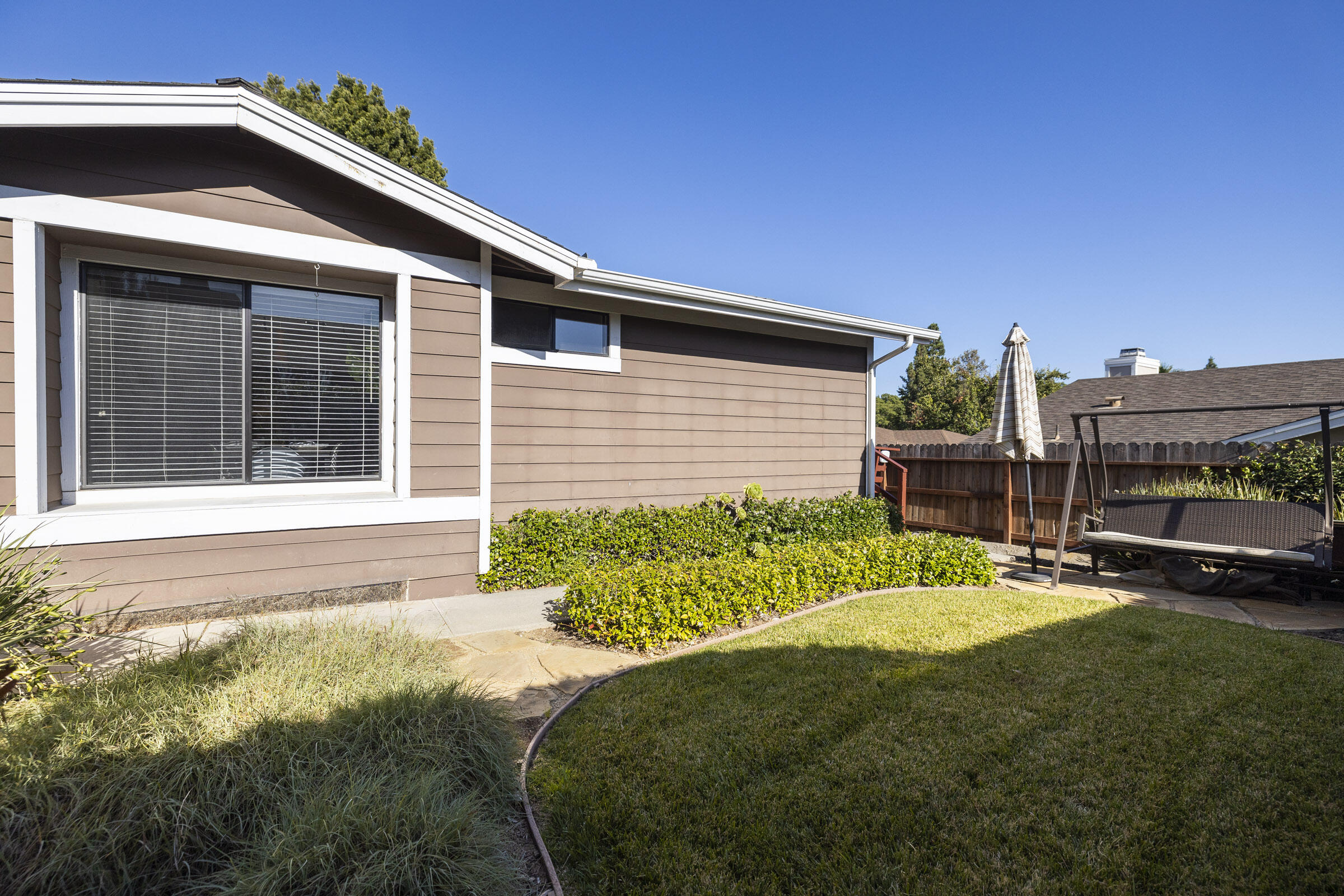 4017 Primavera Road, Unit A Santa Barbara, CA 93110 - Photo 14 of 17 a view of a house with backyard and sitting area
