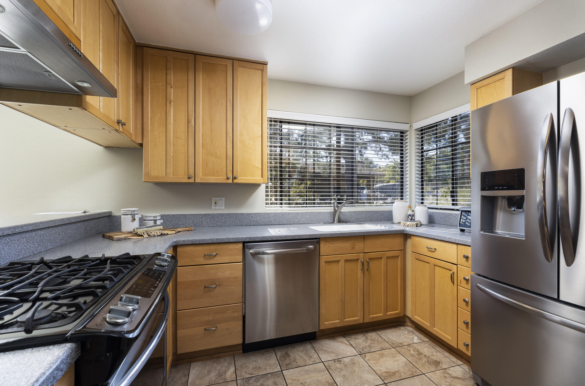 4017 Primavera Road, Unit A Santa Barbara, CA 93110 - Photo 5 of 17 a kitchen with a sink stove and refrigerator