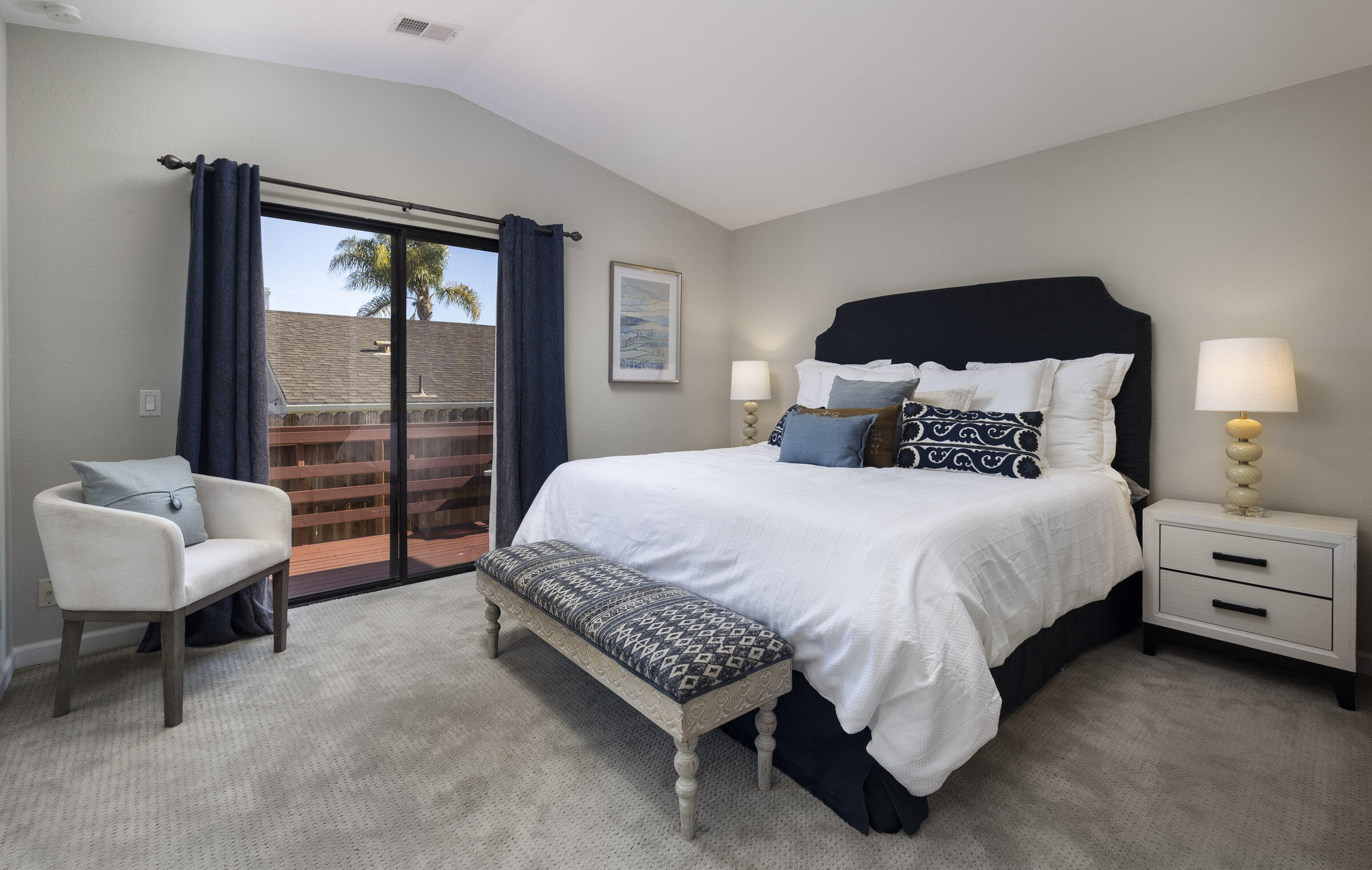 4017 Primavera Road, Unit A Santa Barbara, CA 93110 - Photo 8 of 17 a spacious bedroom with a bed and a couch