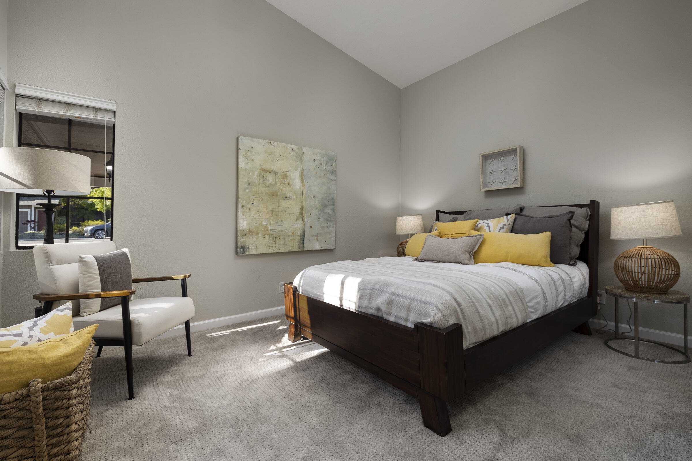 4017 Primavera Road, Unit A Santa Barbara, CA 93110 - Photo 10 of 17 a spacious bedroom with a bed and chair