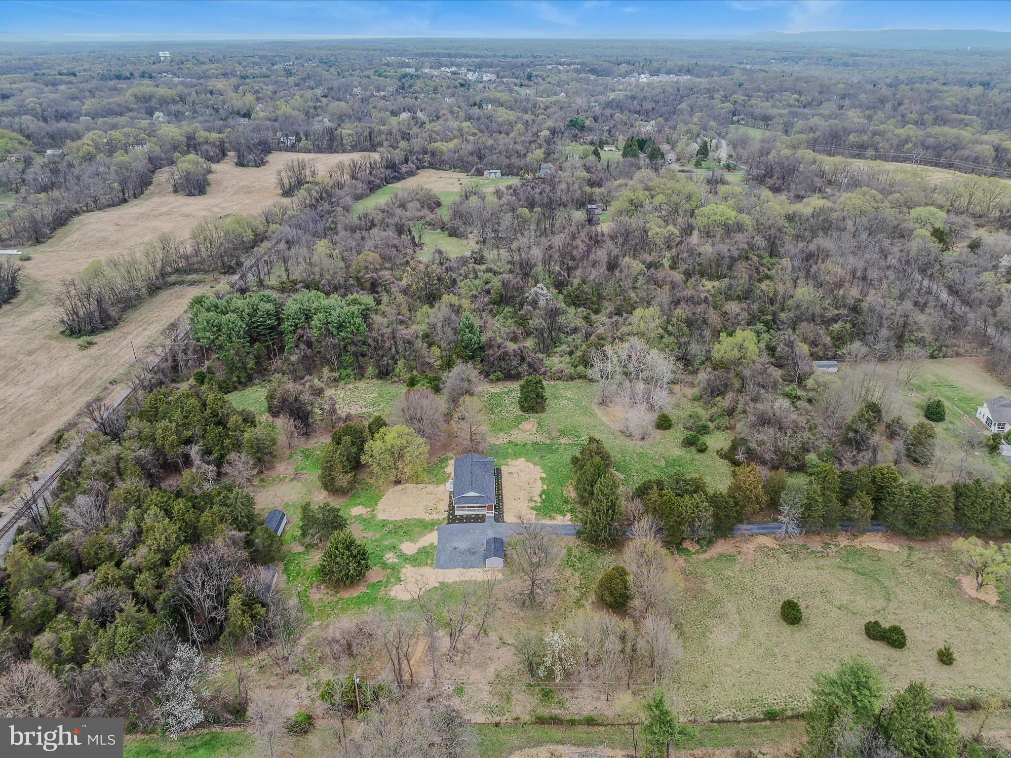 89 Morgan Grove Road Shepherdstown, WV 25443 - Photo 64 of 68 an aerial view of a house with a yard