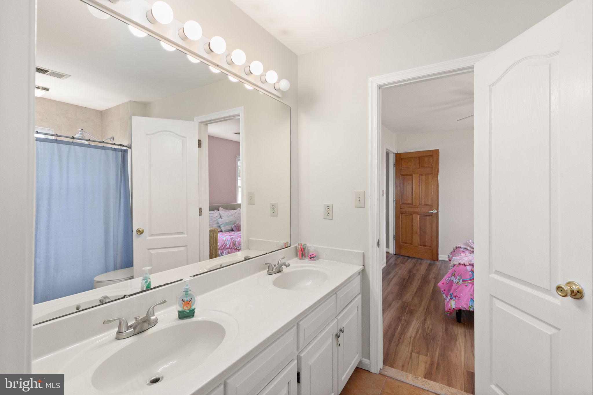 2140 Marston Road New Windsor, MD 21776 - Photo 29 of 48 a bathroom with a sink vanity tub and shower