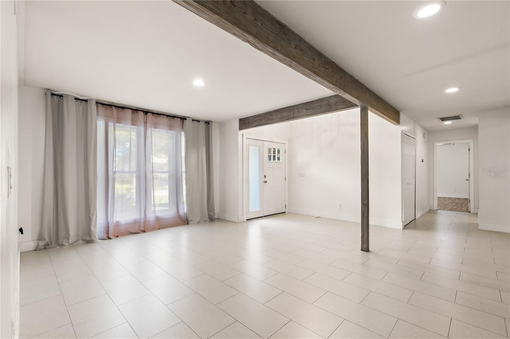 4951 Courtland Loop Winter Springs, FL 32708 - Photo 12 of 36 a view of a livingroom with a staircase