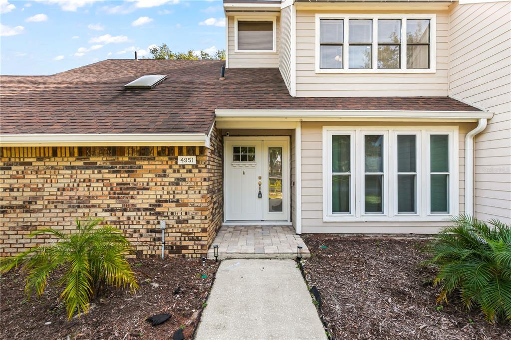4951 Courtland Loop Winter Springs, FL 32708 - Photo 2 of 36 front view of a house with a window