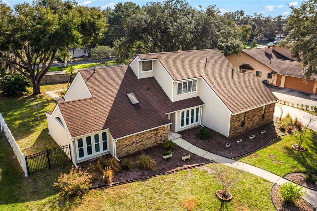 4951 Courtland Loop Winter Springs, FL 32708 - Photo 28 of 36 an aerial view of a house with swimming pool and sitting area