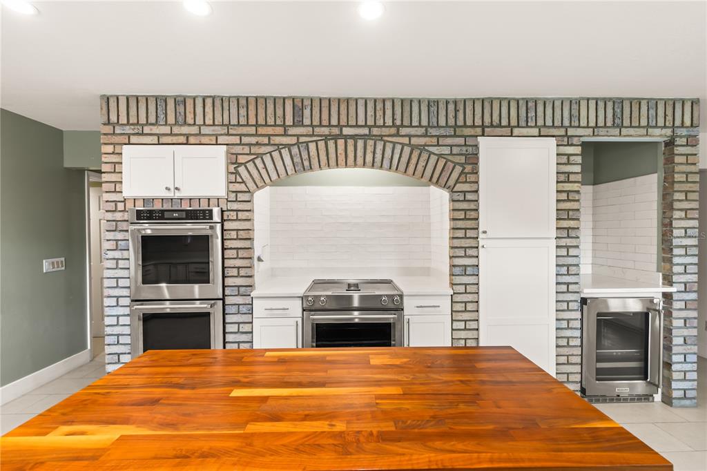 4951 Courtland Loop Winter Springs, FL 32708 - Photo 9 of 36 a view of a livingroom with a fireplace