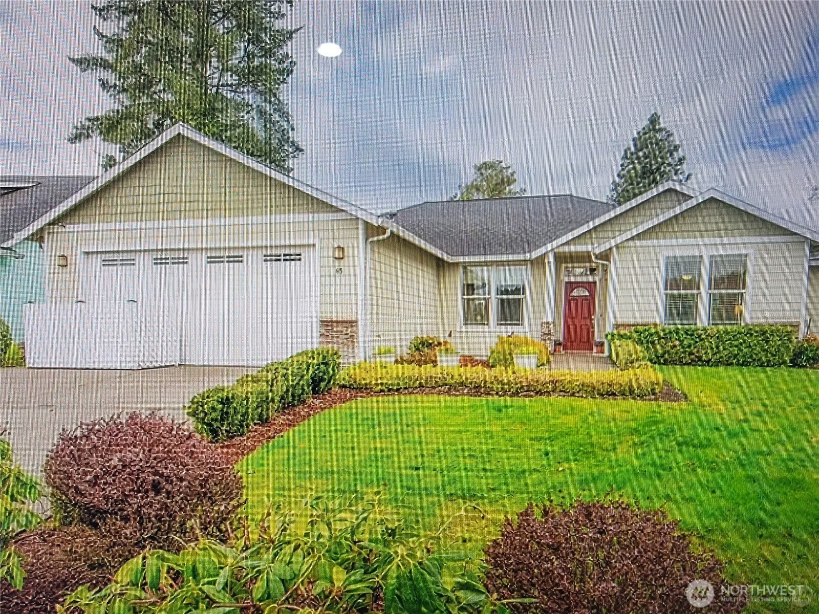 65 Willow Pointe Loop Longview, WA 98632 - Photo 1 of 1 a view of a house with a yard and potted plants