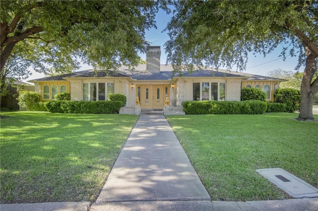 front view of a house and a yard