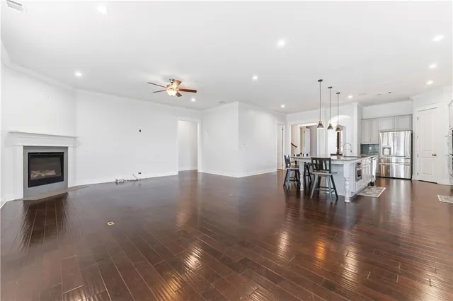 a view of dining room with furniture and wooden floor