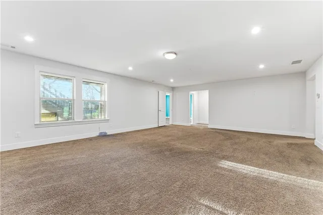 an empty room with windows