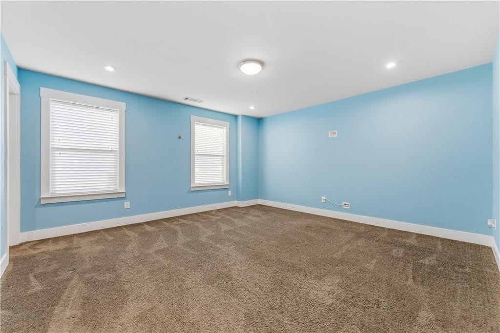 601 Long Leaf Way Canton, GA 30114 - Photo 29 of 42 an empty room with windows