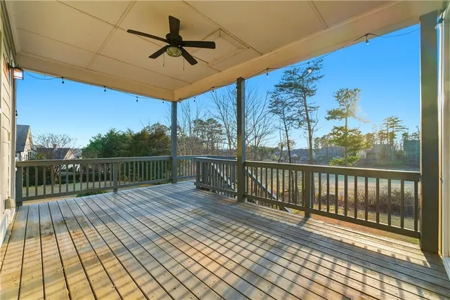 a view of a balcony with wooden floor