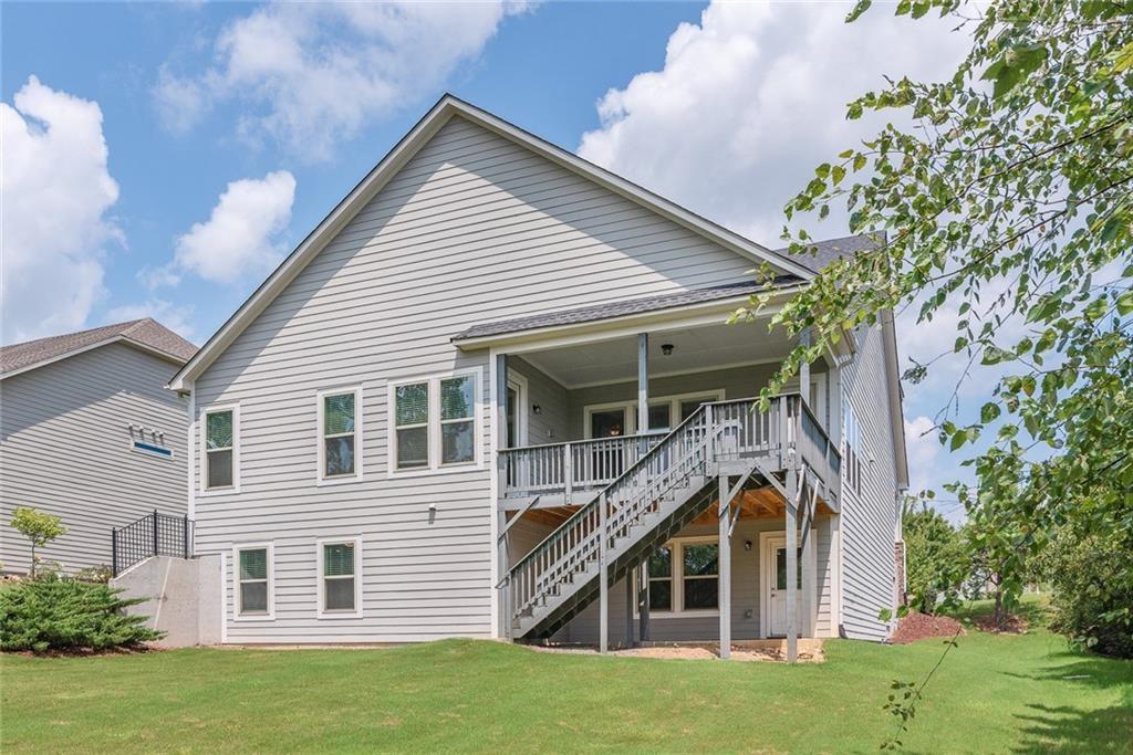 601 Long Leaf Way Canton, GA 30114 - Photo 6 of 42 a view of house with a yard