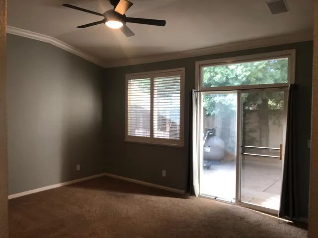 a view of an empty room and window