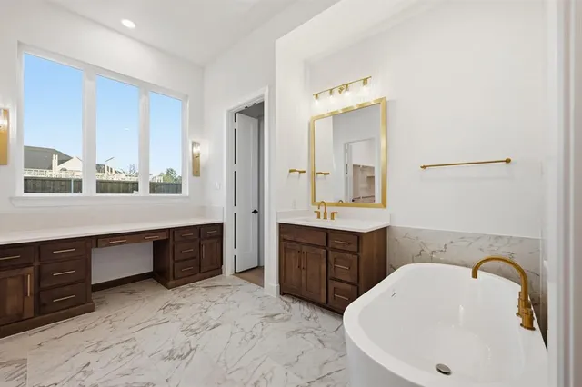 a bathroom with a sink and a bathtub