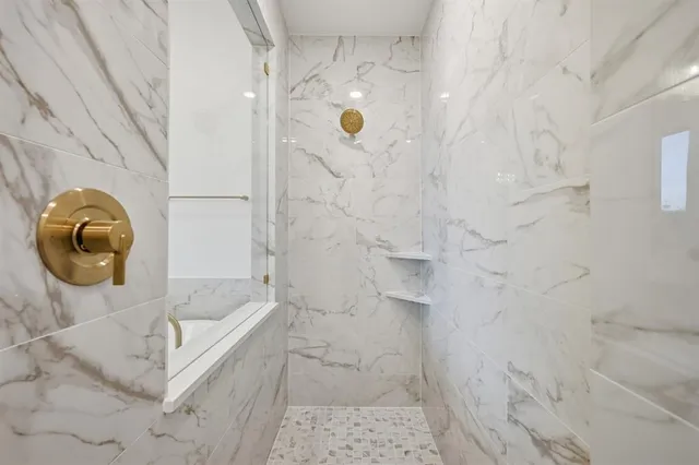 a bathroom with a sink and mirror