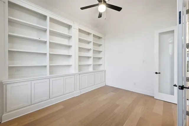 a view of an empty room with empty racks