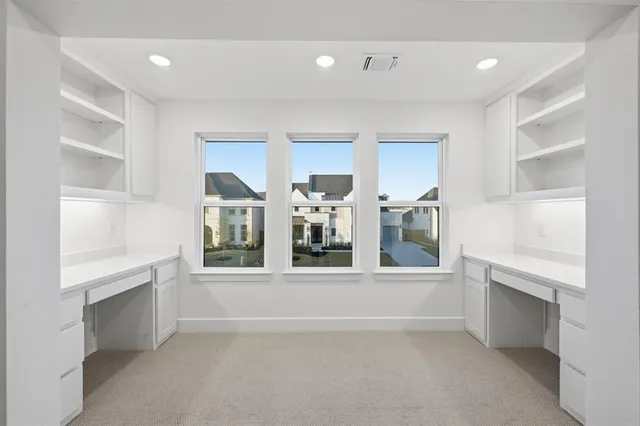 a view of an empty room with window