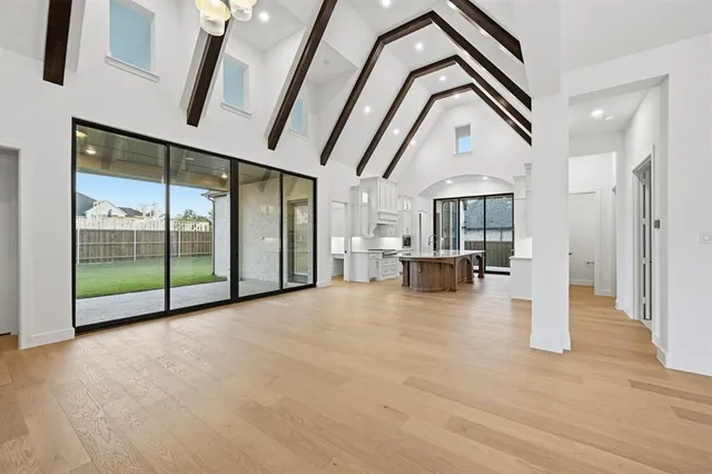 a view of an entryway with wooden floor