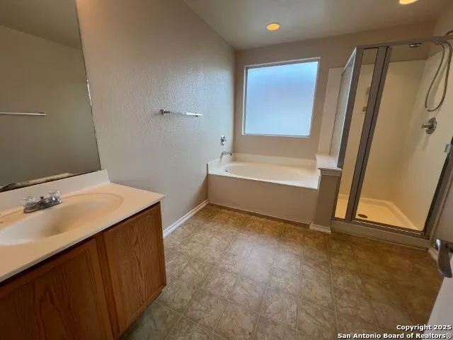 a bathroom with a sink and a tub