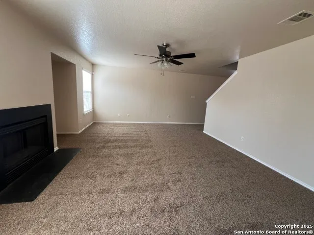 a view of a livingroom with a fireplace