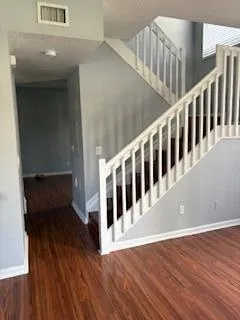 a view of entryway with wooden floor