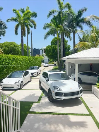 a view of a patio with couches and a fire pit