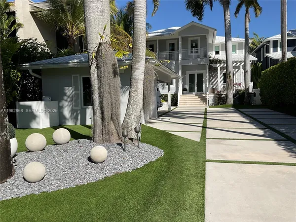 a close view of light fixtures and a mirror of a bathroom