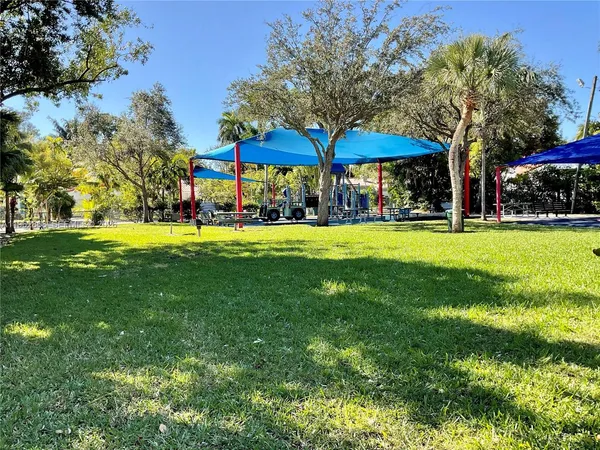 a view of a park with tree s