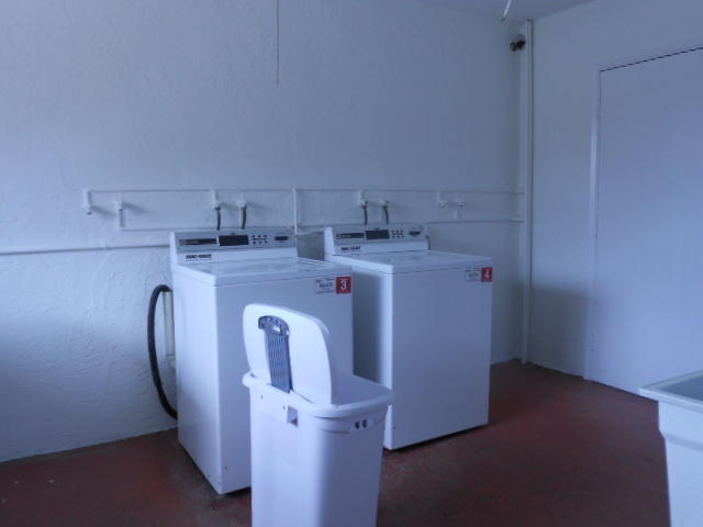 500 Village Green Circle West, Unit 107 Palm Springs, FL 33461 - Photo 11 of 24 Laundry room