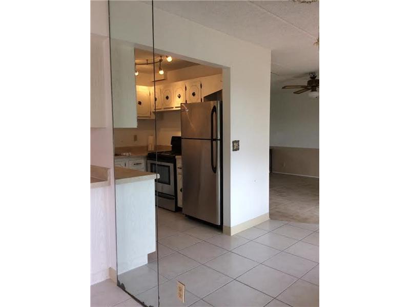 500 Village Green Circle West, Unit 107 Palm Springs, FL 33461 - Photo 3 of 24 Kitchen_Dining Area