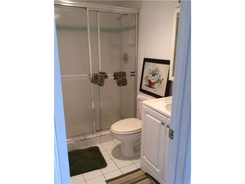 500 Village Green Circle West, Unit 107 Palm Springs, FL 33461 - Photo 7 of 24 Bathroom