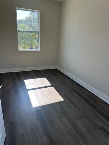 a bathroom with a sink and cabinets