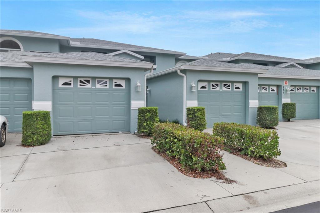 875 New Waterford Drive, Unit T201 Naples, FL 34104 - Photo 18 of 25 front view of a house