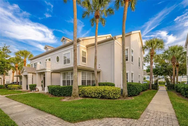 a view of a building with a yard