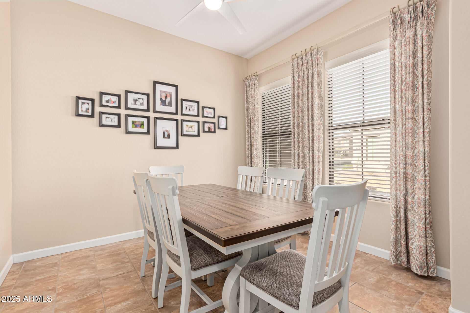4777 South Fulton Ranch Boulevard, Unit 1027 Chandler, AZ 85248 - Photo 12 of 50 a view of a dining room with furniture and a window