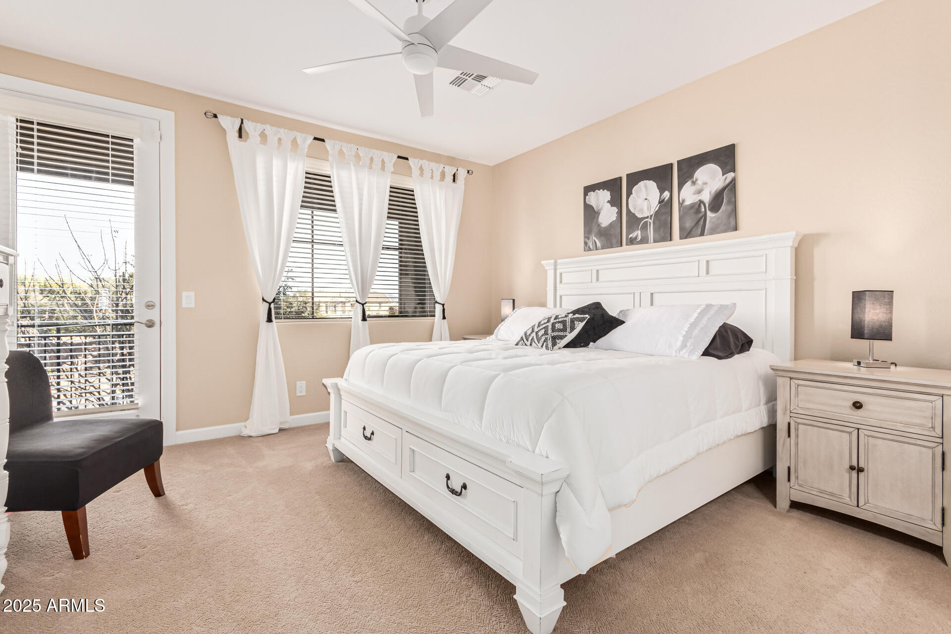 4777 South Fulton Ranch Boulevard, Unit 1027 Chandler, AZ 85248 - Photo 17 of 50 a large white bed sitting in a bedroom next to a window with a dresser