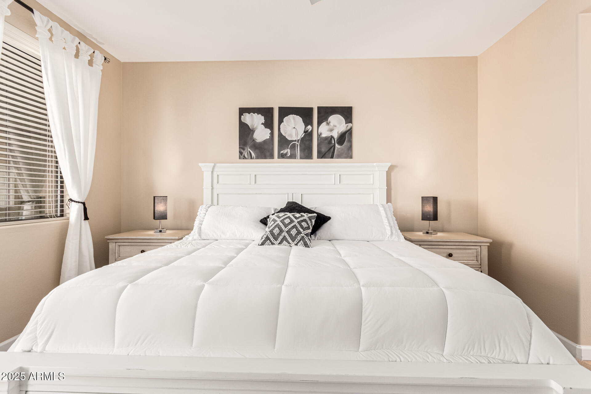 4777 South Fulton Ranch Boulevard, Unit 1027 Chandler, AZ 85248 - Photo 19 of 50 a large white bed in a white room