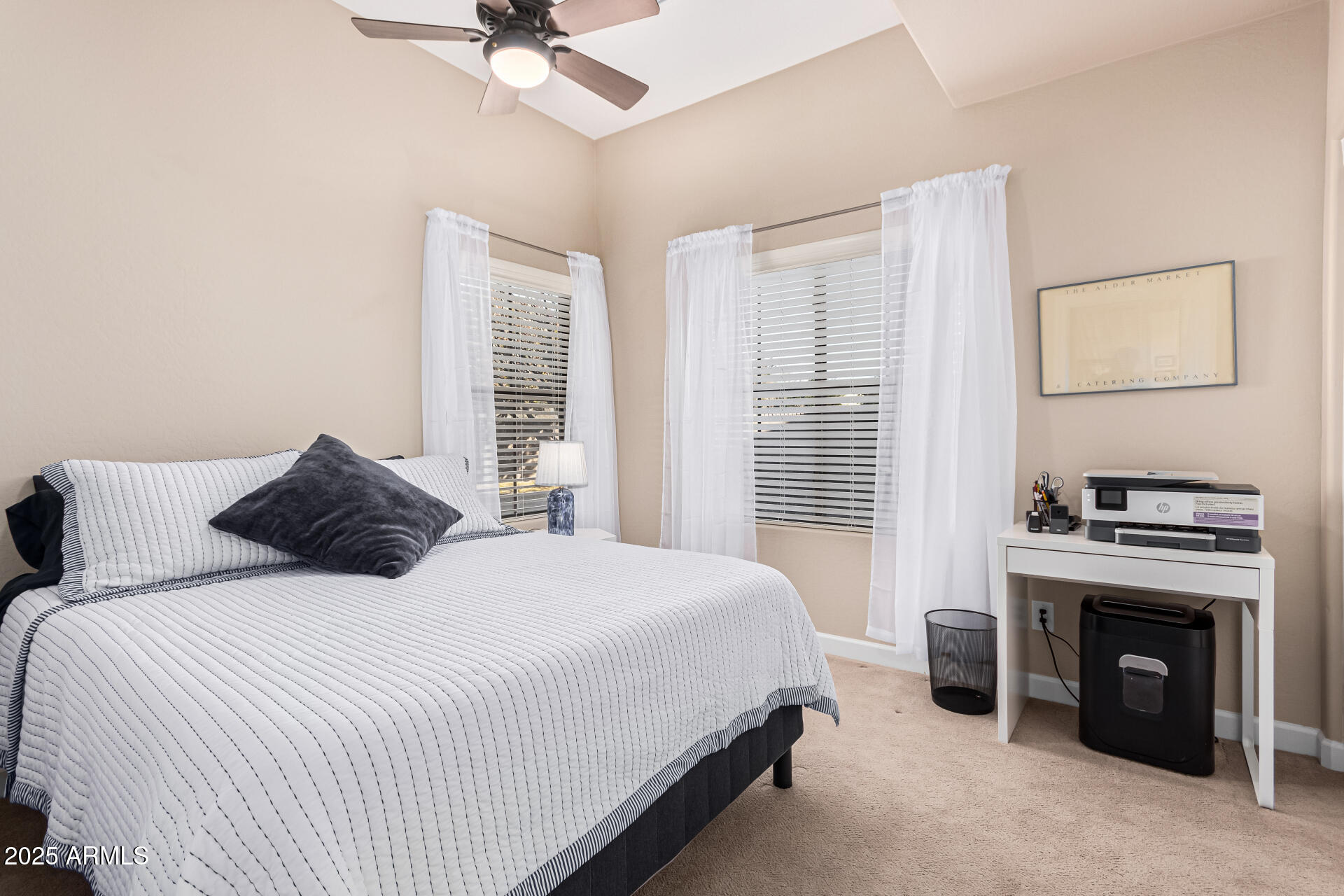 4777 South Fulton Ranch Boulevard, Unit 1027 Chandler, AZ 85248 - Photo 24 of 50 a bedroom with a bed and a fireplace