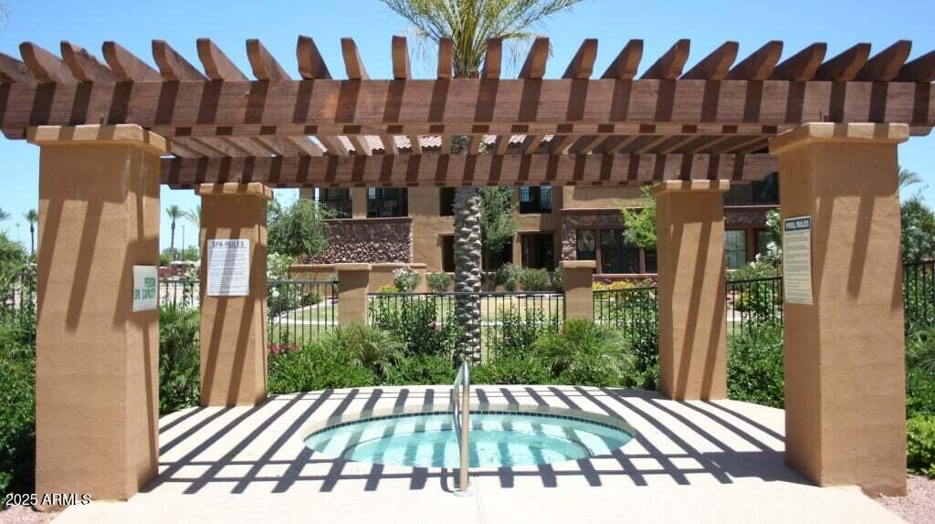 4777 South Fulton Ranch Boulevard, Unit 1027 Chandler, AZ 85248 - Photo 36 of 50 a view of a backyard